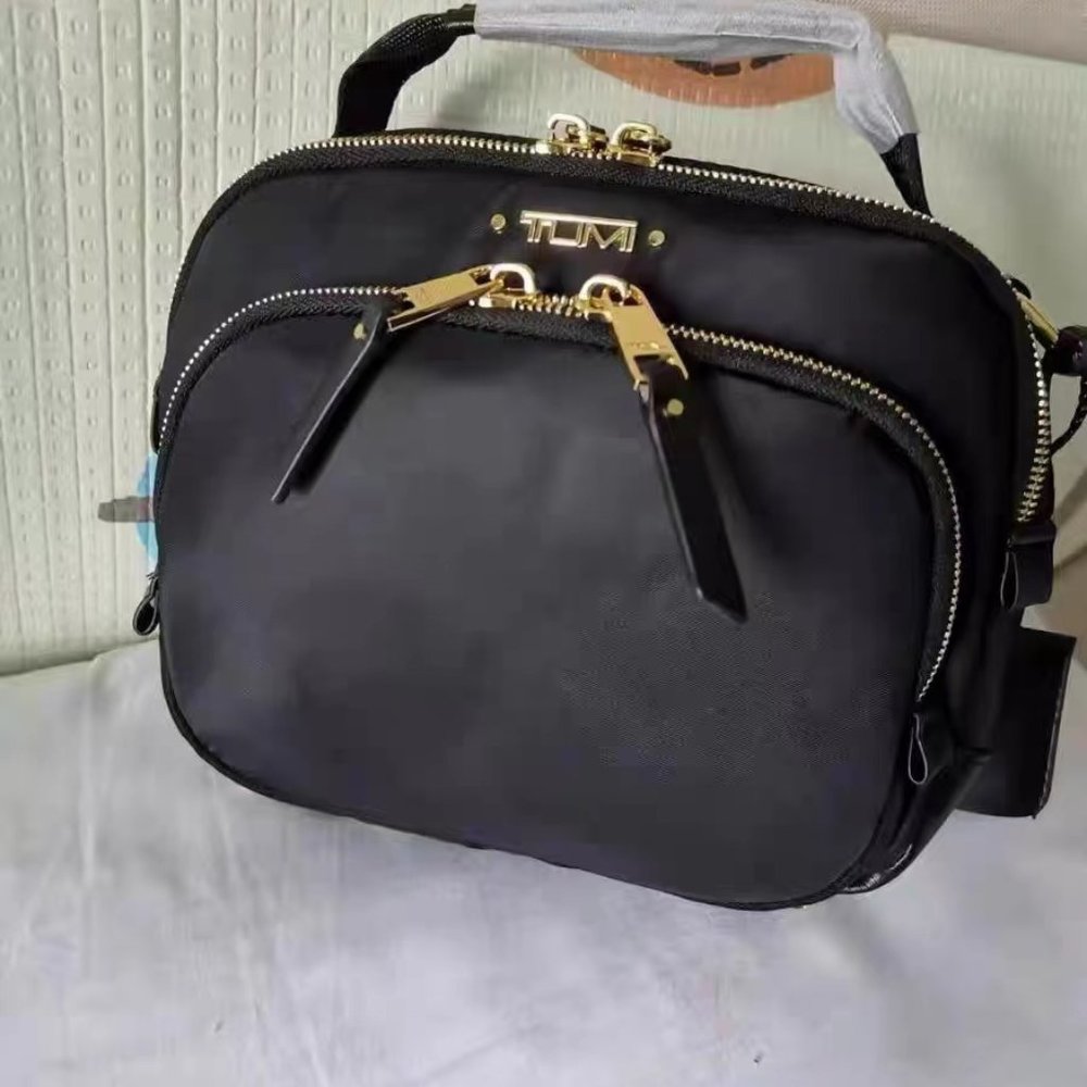 TUMI VOYAGEUR BLACK NYLON CROSSBODY BAG